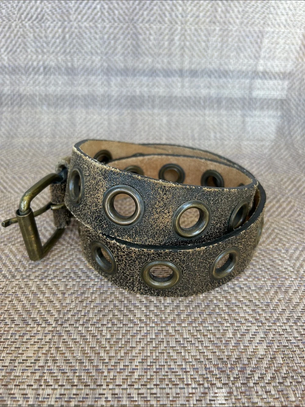 Women’s Vintage Distressed brown/tan Leather Grommet Belt. Size Small.